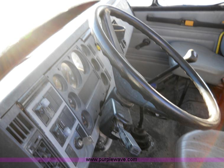 image for item 7815 1996 Freightliner FL70 semi truck