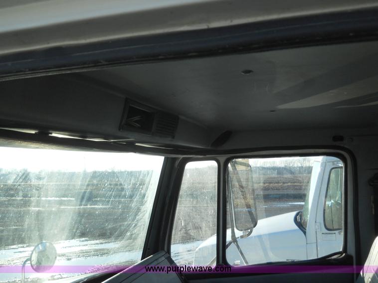 image for item 7815 1996 Freightliner FL70 semi truck