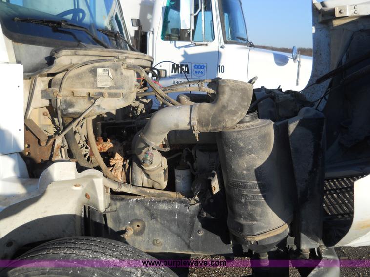 image for item 7815 1996 Freightliner FL70 semi truck