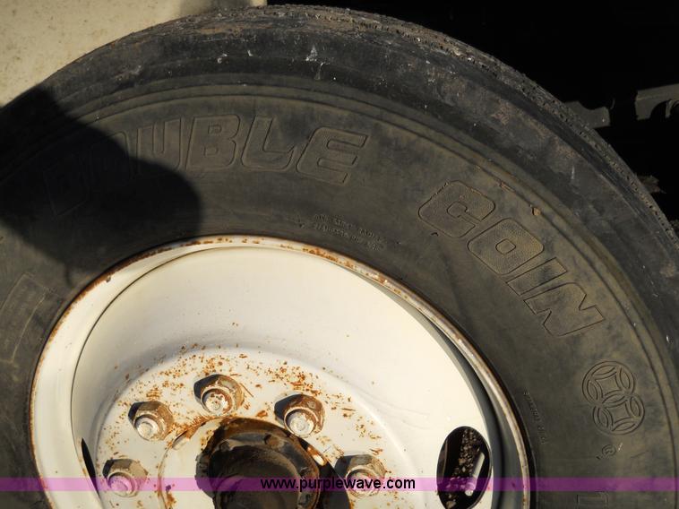 image for item 7815 1996 Freightliner FL70 semi truck