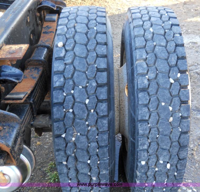 image for item 7815 1996 Freightliner FL70 semi truck