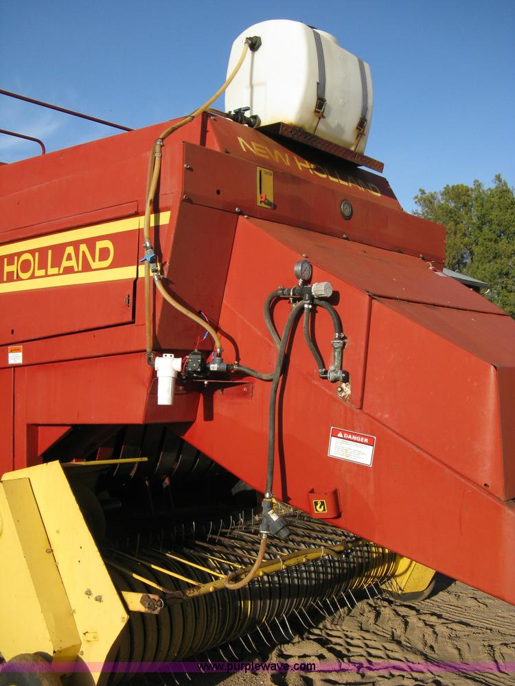 image for item 8040 1996 New Holland D2000 3x4 large square baler with accumulator