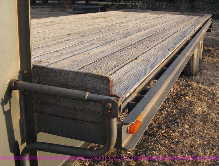 image for item 8053 1993 Diamond D goose neck flatbed trailer