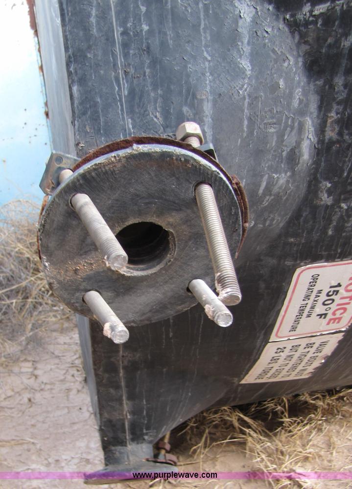 image for item 3532 Approximately 7,000 gallon poly tank with base