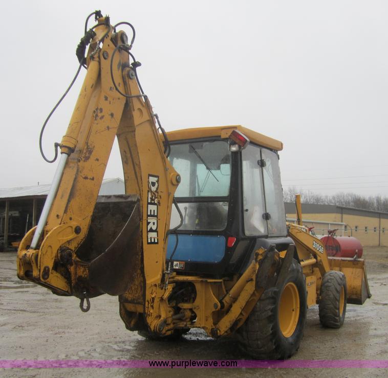 image for item 3695 1999 John Deere 3105E MFWD backhoe
