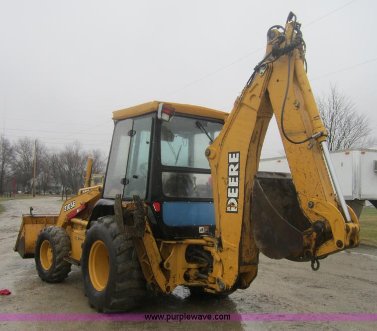 image for item 3695 1999 John Deere 3105E MFWD backhoe