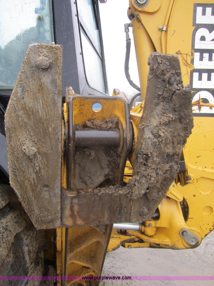 image for item 3695 1999 John Deere 3105E MFWD backhoe