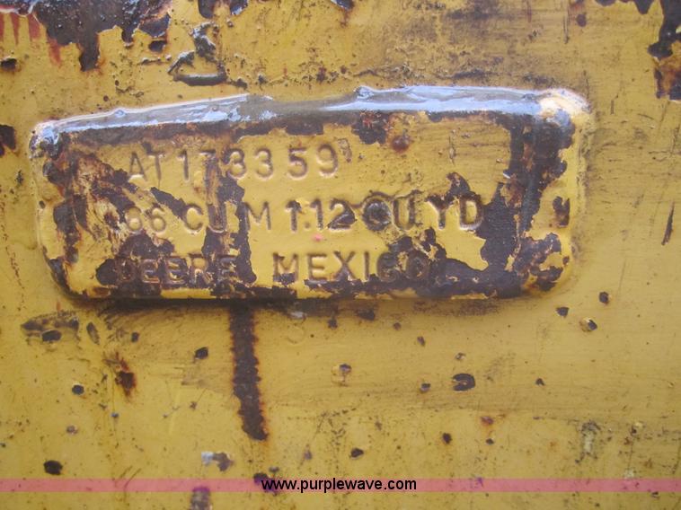 image for item 3695 1999 John Deere 3105E MFWD backhoe