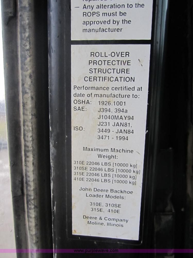 image for item 3695 1999 John Deere 3105E MFWD backhoe