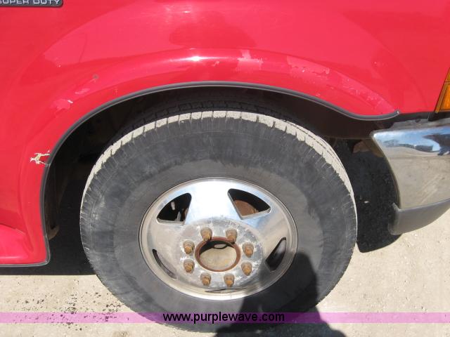 image for item 5398 1999 Ford F350 Super Duty crew cab dually pickup truck