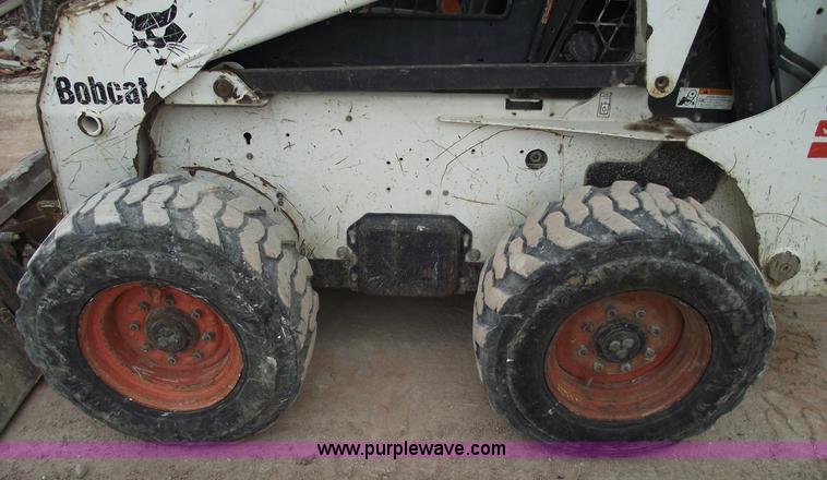 image for item 5560 2003 Bobcat S250 skid steer