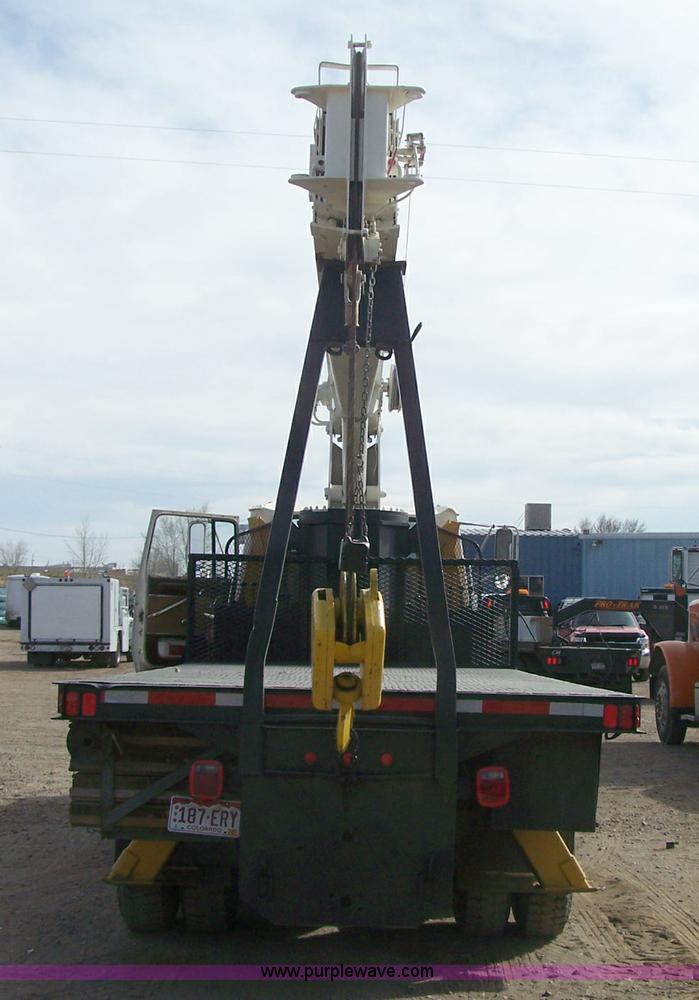 image for item 8083 1984 Ford LT8000 semi truck with Terex RO boom