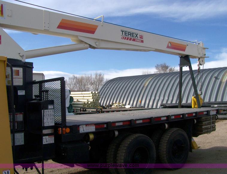 image for item 8083 1984 Ford LT8000 semi truck with Terex RO boom