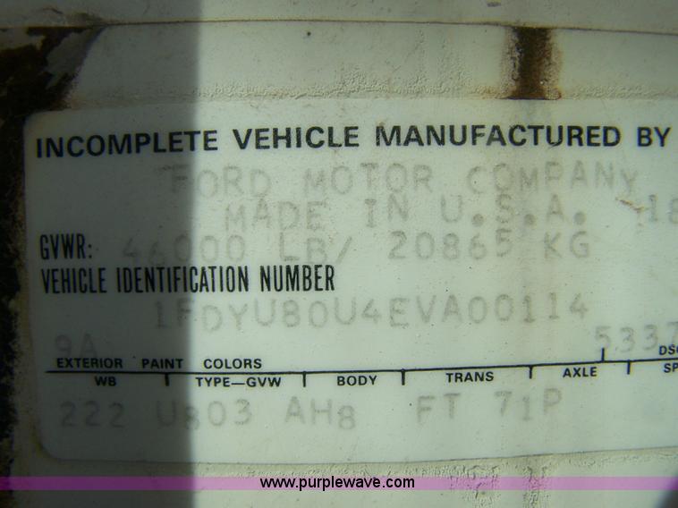 image for item 8083 1984 Ford LT8000 semi truck with Terex RO boom