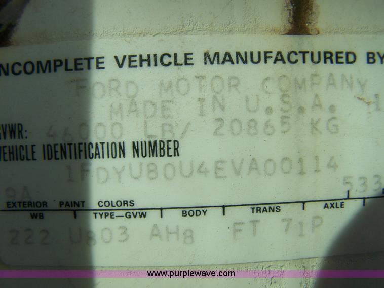 image for item 8083 1984 Ford LT8000 semi truck with Terex RO boom