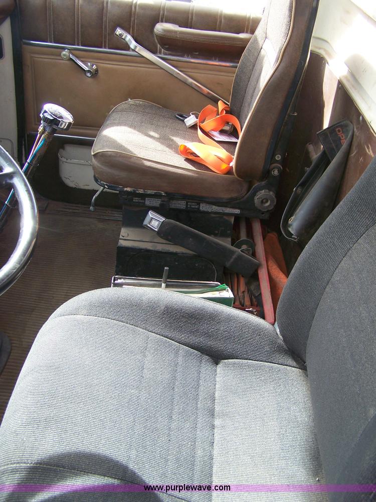 image for item 8083 1984 Ford LT8000 semi truck with Terex RO boom