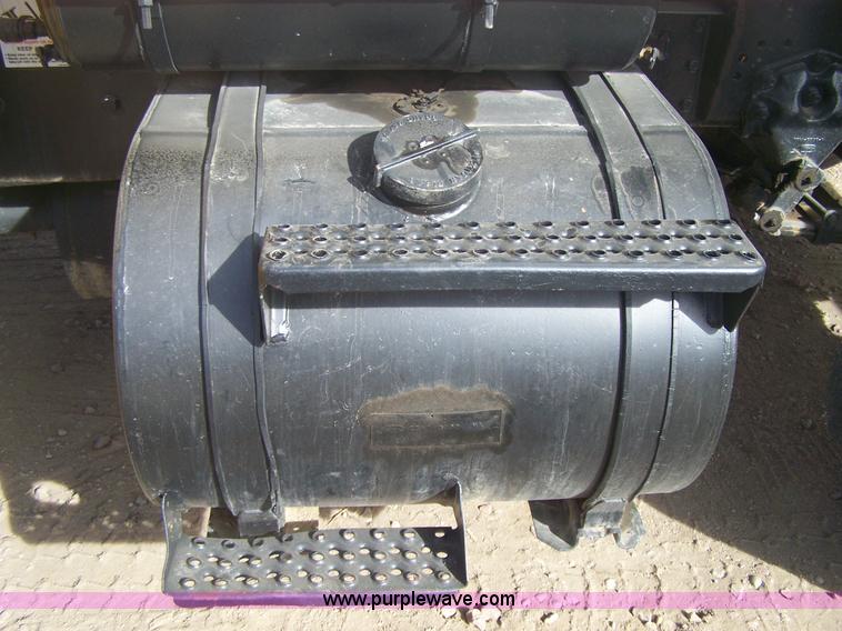 image for item 8083 1984 Ford LT8000 semi truck with Terex RO boom