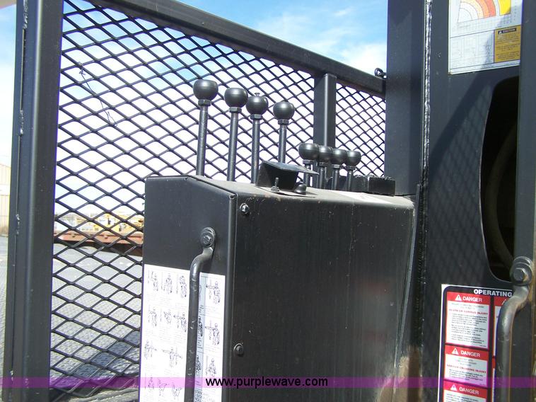 image for item 8083 1984 Ford LT8000 semi truck with Terex RO boom