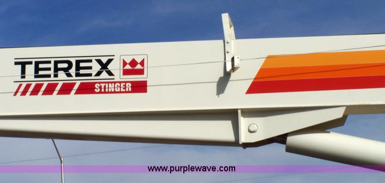 image for item 8083 1984 Ford LT8000 semi truck with Terex RO boom