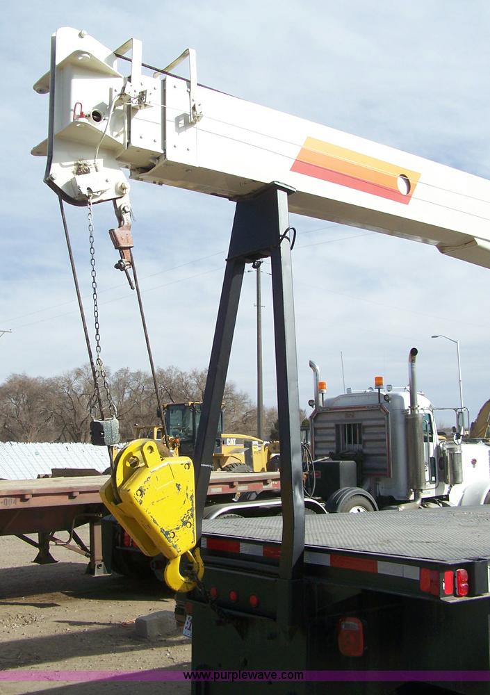 image for item 8083 1984 Ford LT8000 semi truck with Terex RO boom