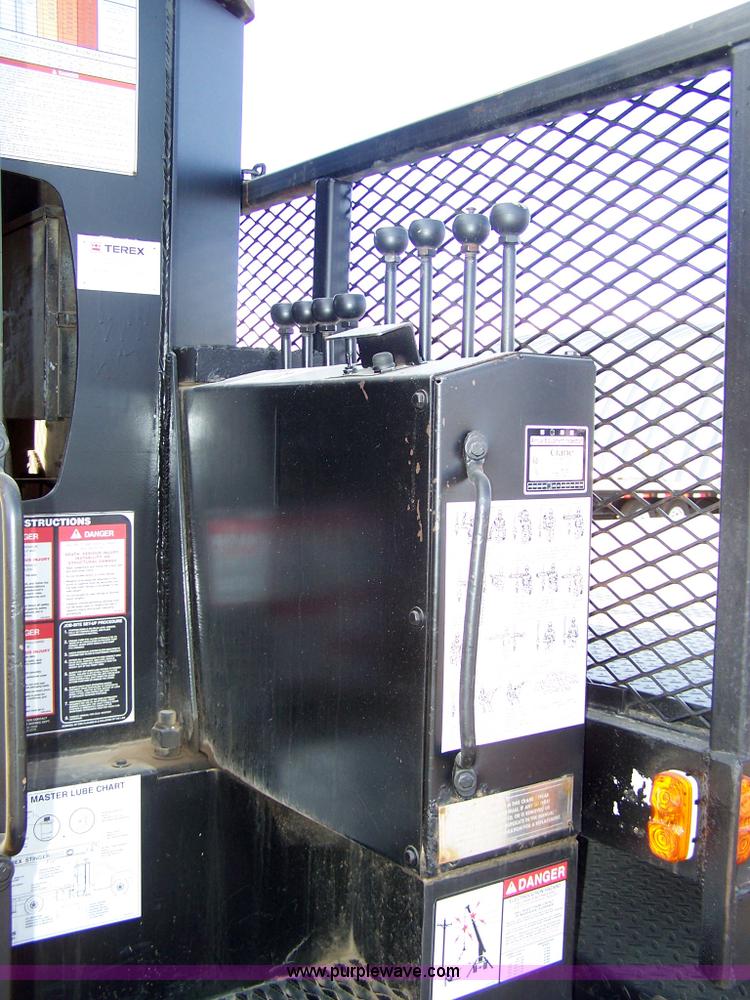 image for item 8083 1984 Ford LT8000 semi truck with Terex RO boom