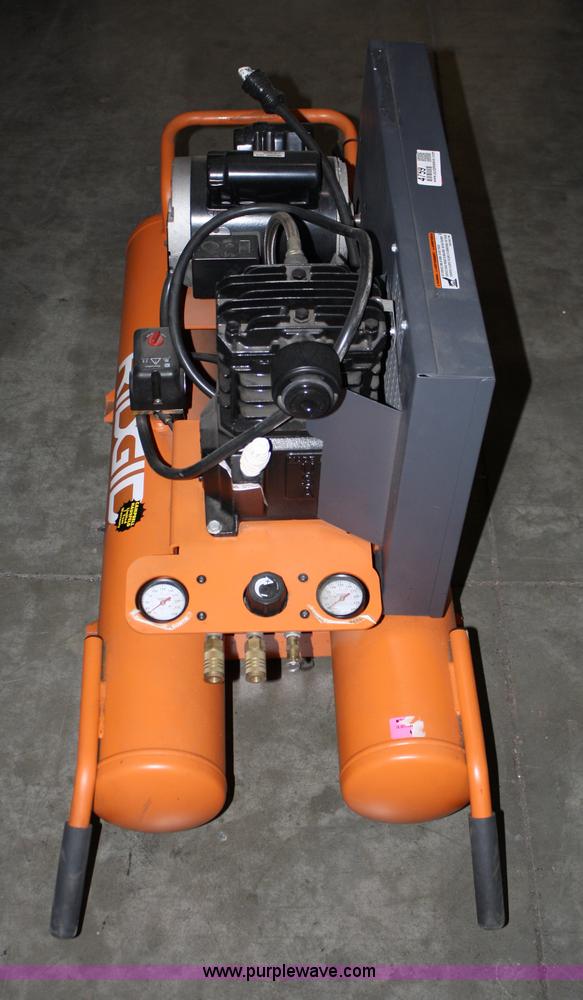 Ridgid electric wheelbarrow air compressor in Spring Hill, KS Item