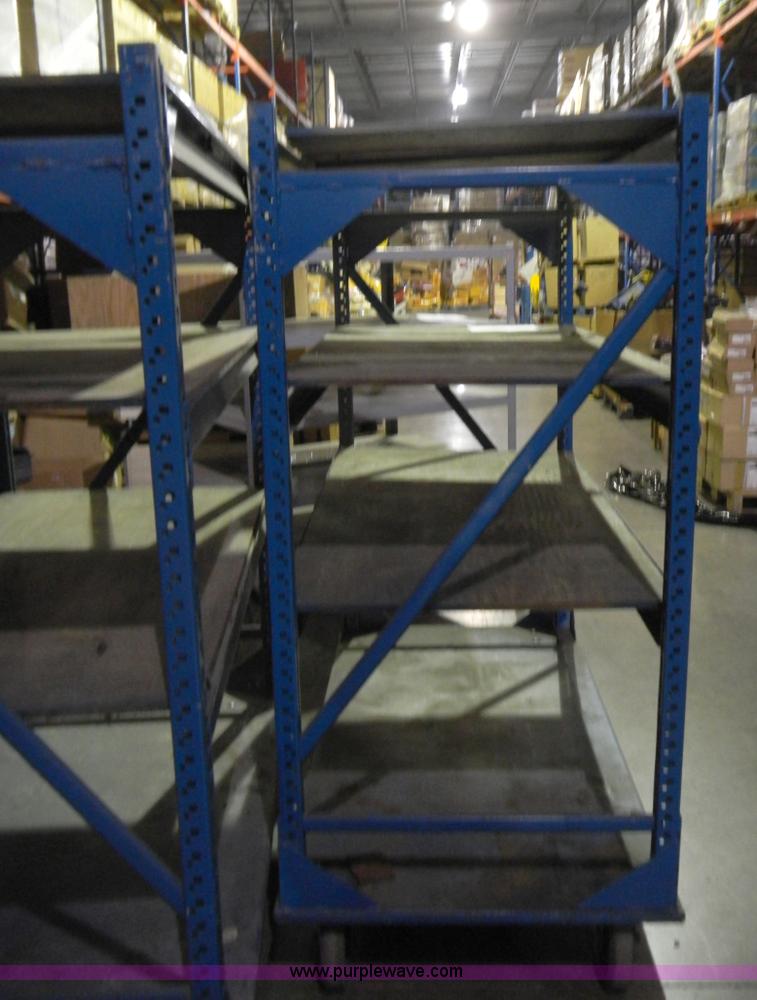 image for item 4867 (3) heavy duty wheeled shelving units