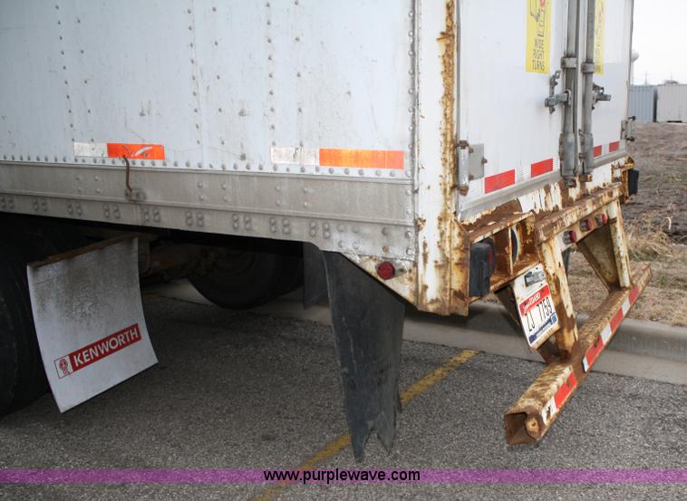 image for item 4984 1994 Stoughton van trailer with shelving and lighting