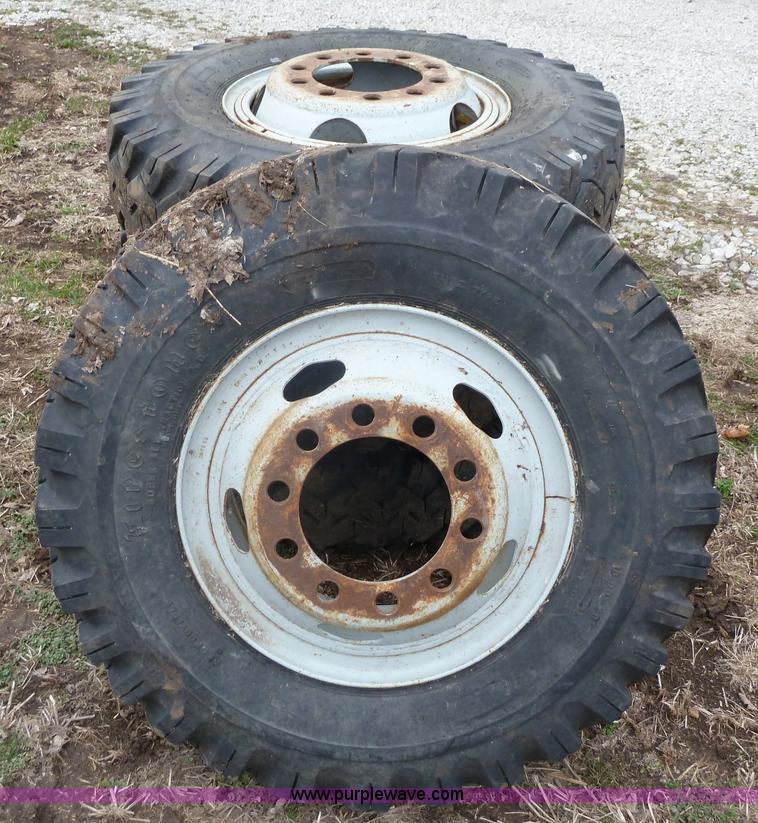 image for item 1702 (4) 10.00-20 Firestone mud truck tires