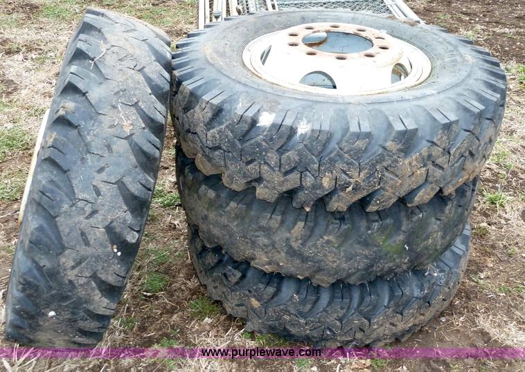 image for item 1702 (4) 10.00-20 Firestone mud truck tires