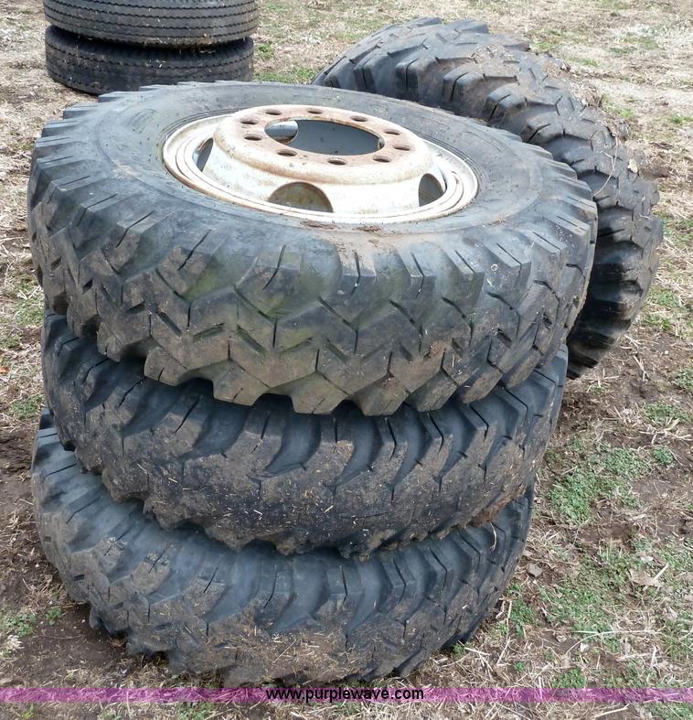 image for item 1702 (4) 10.00-20 Firestone mud truck tires