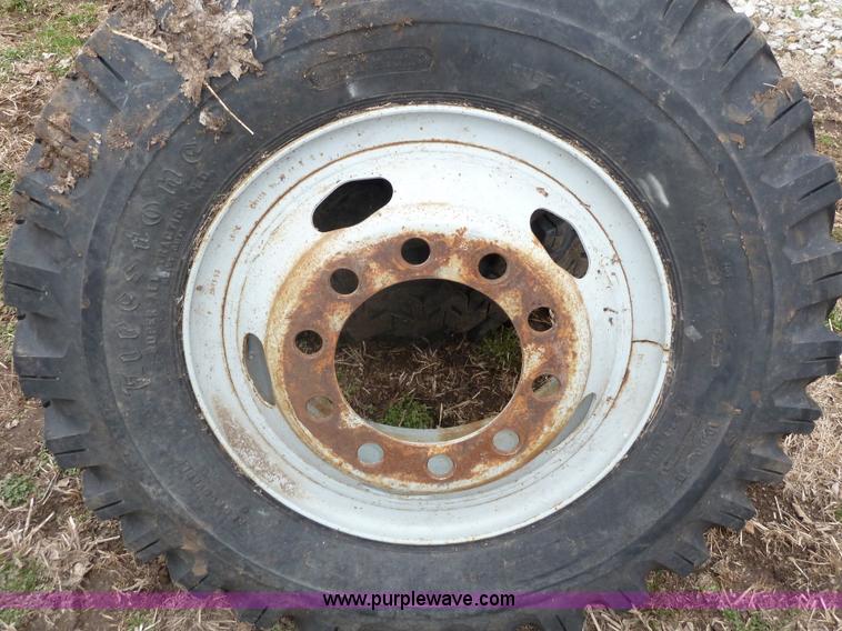 image for item 1702 (4) 10.00-20 Firestone mud truck tires