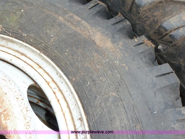 image for item 1702 (4) 10.00-20 Firestone mud truck tires