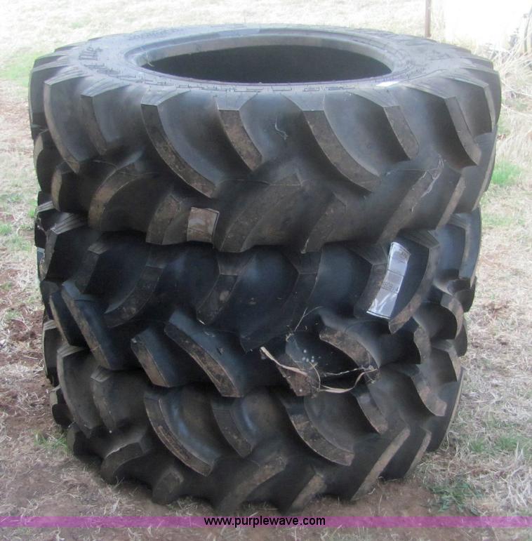 image for item 6997 (3) new 12.4-24 tires