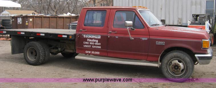 image for item 8012 1991 Ford F350 Custom XLT Lariat four-door flatbed dually pickup