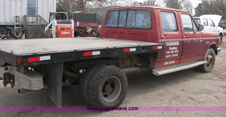 image for item 8012 1991 Ford F350 Custom XLT Lariat four-door flatbed dually pickup