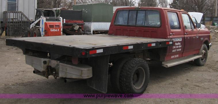 image for item 8012 1991 Ford F350 Custom XLT Lariat four-door flatbed dually pickup