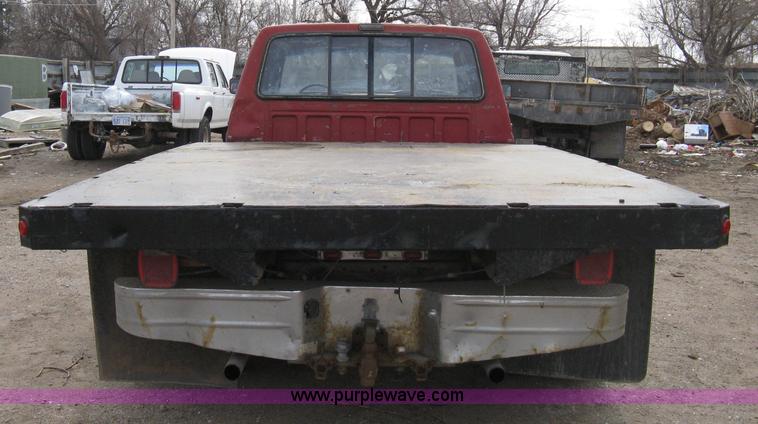 image for item 8012 1991 Ford F350 Custom XLT Lariat four-door flatbed dually pickup