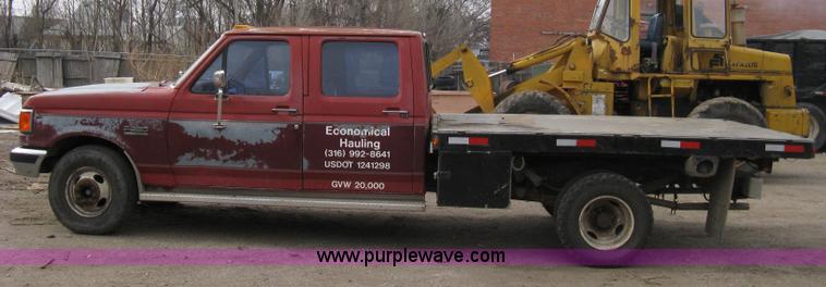 image for item 8012 1991 Ford F350 Custom XLT Lariat four-door flatbed dually pickup