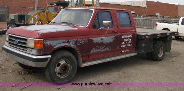 image for item 8012 1991 Ford F350 Custom XLT Lariat four-door flatbed dually pickup