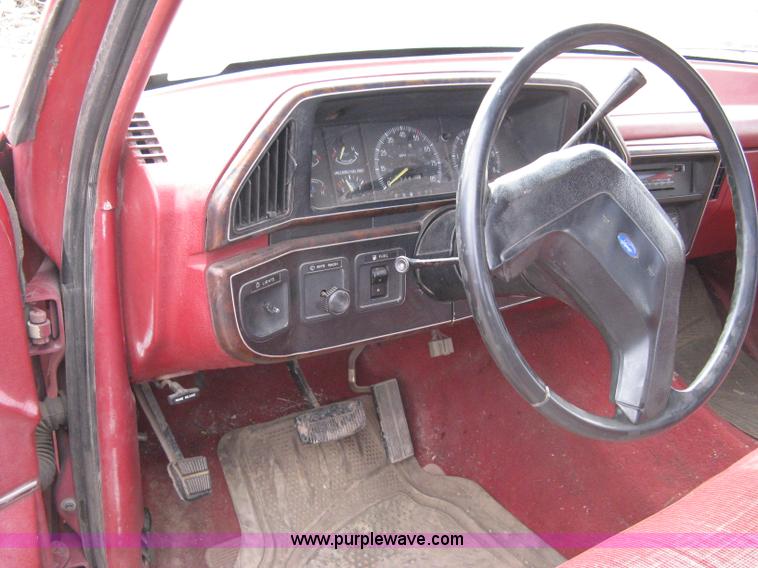 image for item 8012 1991 Ford F350 Custom XLT Lariat four-door flatbed dually pickup