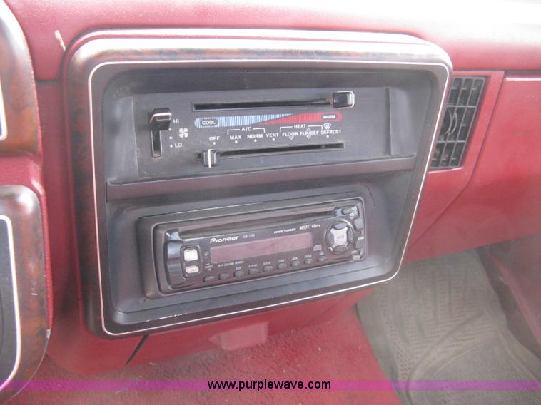 image for item 8012 1991 Ford F350 Custom XLT Lariat four-door flatbed dually pickup