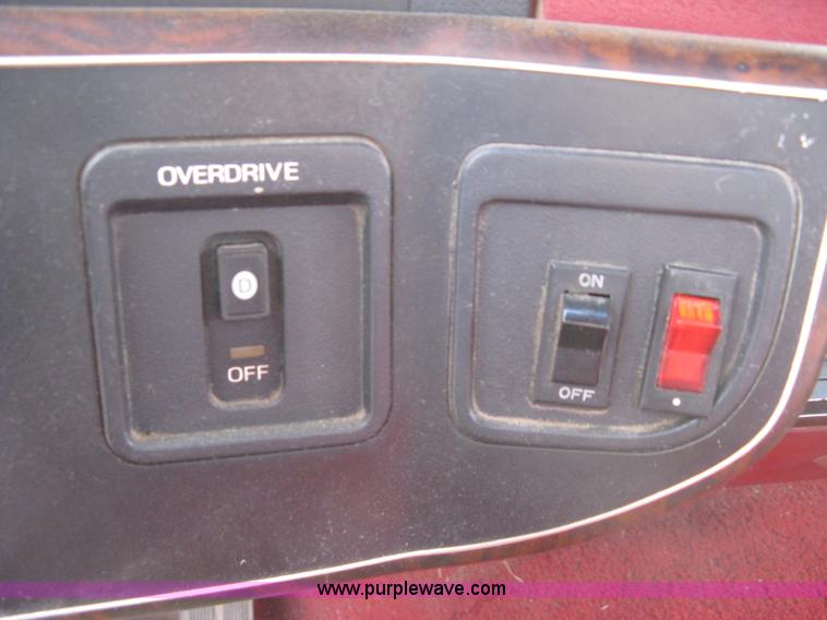 image for item 8012 1991 Ford F350 Custom XLT Lariat four-door flatbed dually pickup