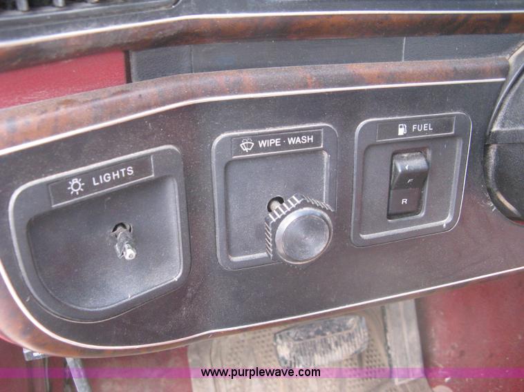 image for item 8012 1991 Ford F350 Custom XLT Lariat four-door flatbed dually pickup