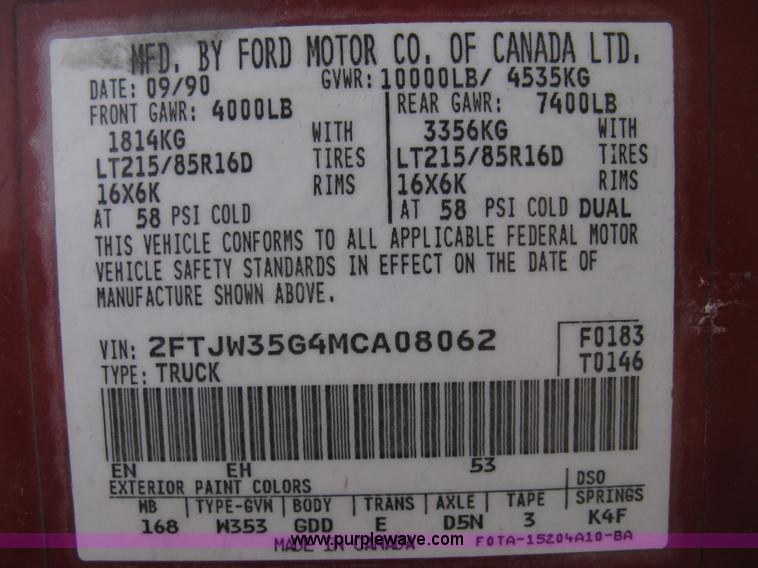 image for item 8012 1991 Ford F350 Custom XLT Lariat four-door flatbed dually pickup