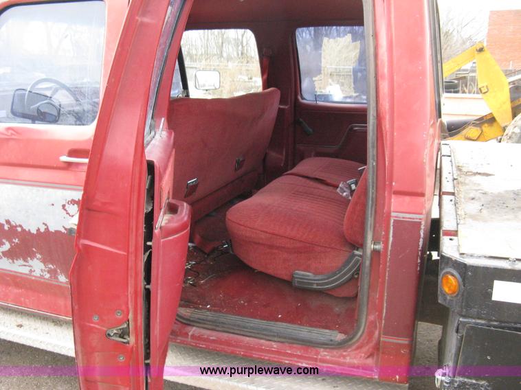 image for item 8012 1991 Ford F350 Custom XLT Lariat four-door flatbed dually pickup