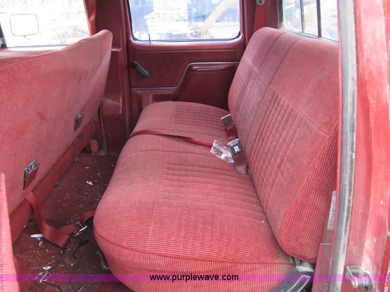 image for item 8012 1991 Ford F350 Custom XLT Lariat four-door flatbed dually pickup