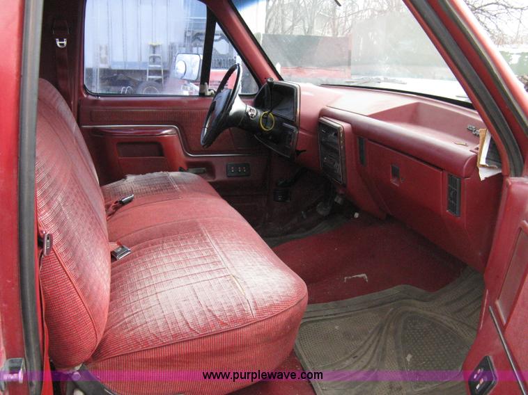 image for item 8012 1991 Ford F350 Custom XLT Lariat four-door flatbed dually pickup