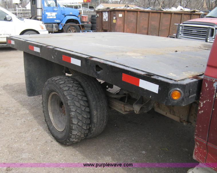 image for item 8012 1991 Ford F350 Custom XLT Lariat four-door flatbed dually pickup