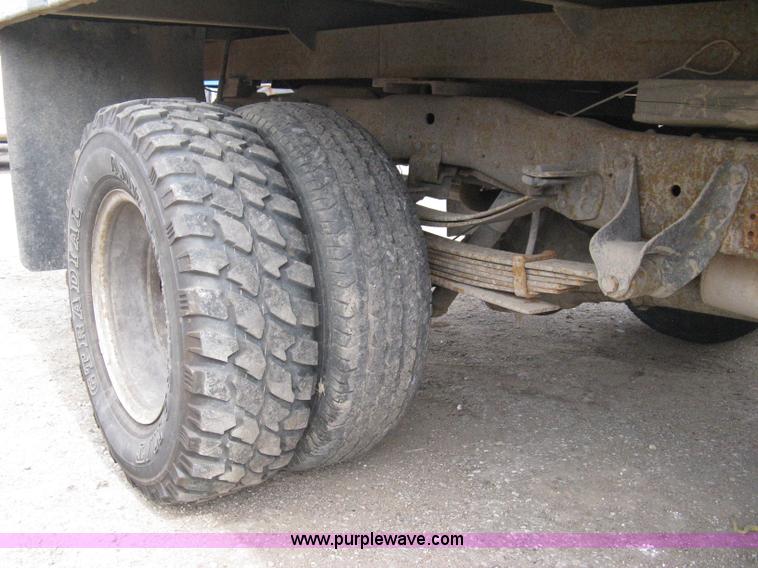 image for item 8012 1991 Ford F350 Custom XLT Lariat four-door flatbed dually pickup